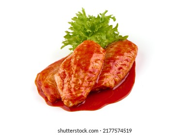 Marinated Buffalo Chicken Wings In Red Sauce With Lettuce Salad Leaf, Isolated On White Background