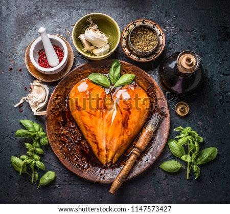 Image, Stock Photo Marinated heart-shaped chicken breast fillet with rubbing brush