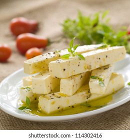 Marinated Goat Cheese With Olive Oil And Basil, Selective Focus