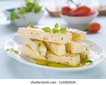 Marinated Goat Cheese With Olive Oil And Basil, Selective Focus