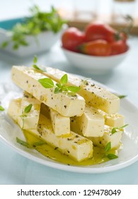 Marinated Goat Cheese With Olive Oil And Basil, Selective Focus