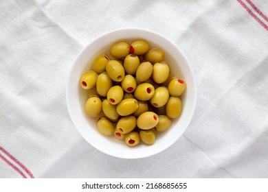 Marinated Green Olives With Pimento Peppers In A Bowl, Top View. Flat Lay, Overhead, From Above. 