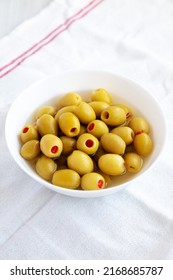 Marinated Green Olives With Pimento Peppers In A Bowl, Low Angle View. 