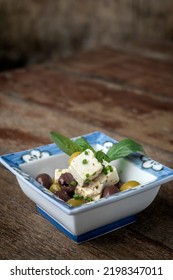 Marinated Spanish Olives And Feta Cheese Tapas In Rustic Barcelona Restaurant