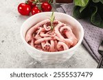 Marinated squid tentacles in the bowl for snack or salad