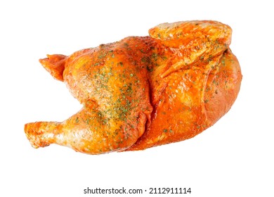 Marinated in tomato sauce with herbs raw half of the chicken  for grill or baking isolated on white background. 