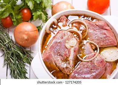 Marinating Meat With Spices And Onion