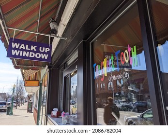 Marine City, Michigan  United States - March 13 2021: The Sweet Tooth Walk Up Window, Nostalgic Candy Shop