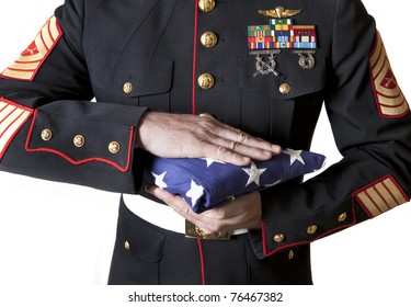 Marine in Dress Blues Holding Flag