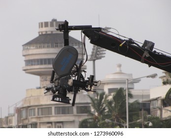 Marine Drive, Mumbai - Jun-2009: A Bollywood Dolly Camera Crane During Shooting At Mumbai Marine Drive, With Ambassador Hotel In Background