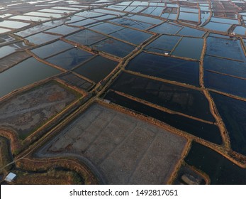 Marine Industry In Indonesia. Fish Farms On Land. Fish Storage Ponds As Livestock View From Above With Aerial Drone Camera