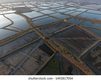 Marine Industry In Indonesia. Fish Farms On Land. Fish Storage Ponds As Livestock View From Above With Aerial Drone Camera