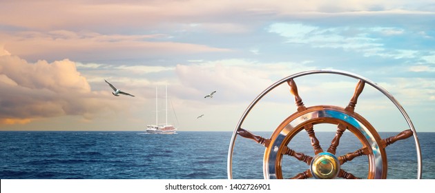 Marine landscape with a steering wheel and sailing yacht on skyline. Calm sea with a cloudy sky at sunrise and flying seagulls for your concept about romantic sea voyage on a ship around the world. - Powered by Shutterstock