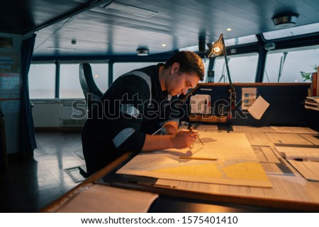 Marine navigational officer during navigational watch on Bridge . He does chart correction of nautical maps and publications. Work at sea