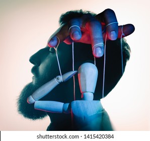 Marionette In Male Head. Concept Of Mind Control. Image