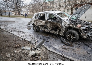 Mariupol, Ukraine Mar 24, 2022: road, neighborhood, houses, car, rocket, grad,fire, bomb, destroyed, shooting,