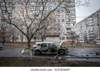 Mariupol, Ukraine Mar 24, 2022: road, neighborhood, houses, car, rocket, grad, fire, bomb, snipped, shooting,