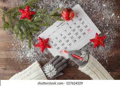 Mark the Date calendar for Christmas, December 25, with festive decorations - Powered by Shutterstock