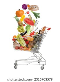Market assortment. Different products falling into shopping cart on white background