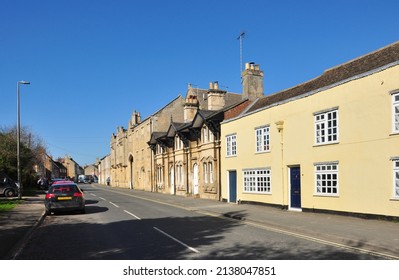 MARKET DEEPING, LINCOLNSHIRE, UK - March 19, 2022. Old buildings in the High Street (including the Grade II listed Welby House), Market Deeping, Lincolnshire, England, UK