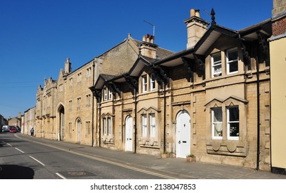 MARKET DEEPING, LINCOLNSHIRE, UK - March 19, 2022. Old buildings in the High Street (including the Grade II listed Welby House), Market Deeping, Lincolnshire, England, UK