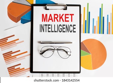 Market Intelligence. Conceptual background with chart ,papers, pen and glasses, business