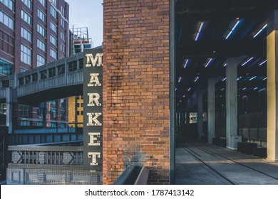 Market Neon Sign Seen From High Line In Chelsea. New York City. The Market Has Lots Of Stores, Restaurants And Food Markets.