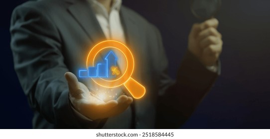 Market Research concept, organized effort to gather information about target markets and customers. Businessman shows glowing neon line of growing graph icon with magnifying glass on virtual screen. - Powered by Shutterstock