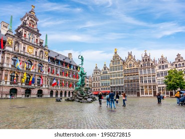 Market square in center of Antwerp with Brabo fountain and City Hall, Belgium - Shutterstock ID 1950272815
