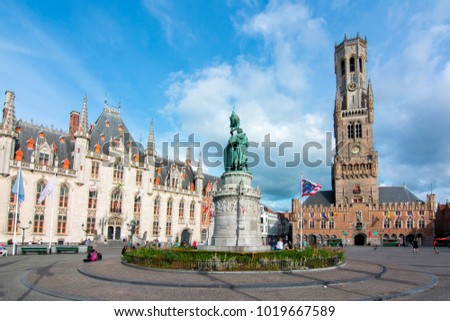 Market square (Grote markt) and Belfort tower in Bruges, Belgium