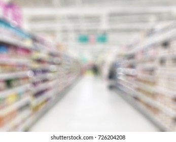 Market store or marketplace shopping blur background of supermarket indoor grocery shop with blurry shelves of food products and diary supplies - Shutterstock ID 726204208