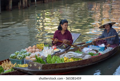 Market Woman On Boat Floating In River Market Sell Fruit And Food 