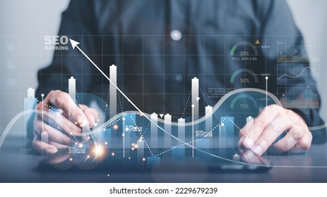 A marketer holds a pen pointing to a graph and shows SEO concepts, optimization analysis tools, search engine rankings, social media sites based on results analysis data.	