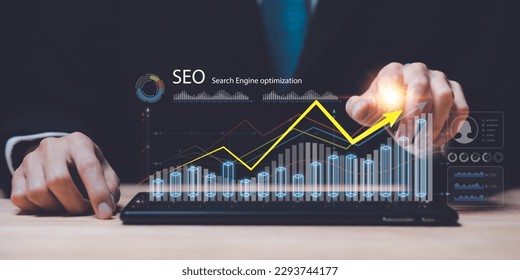 Marketer showing SEO concept,optimization analysis tools, search engine rankings, social media sites based on results analysis data,Website Search Optimization ,Interesting web rankings from visitors