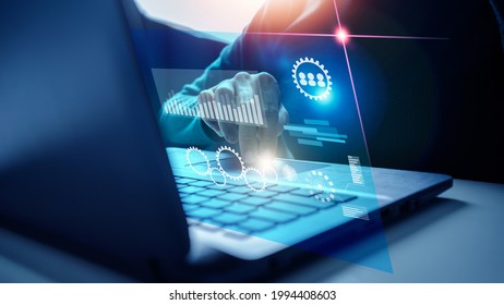 Marketing Business Programmer's big data algorithm with AI virtual interface, futuristic artificial intelligence with charts, financial icons and social graph analysis. - Shutterstock ID 1994408603