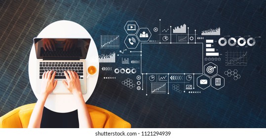 Marketing Concept With Person Using A Laptop On A White Table