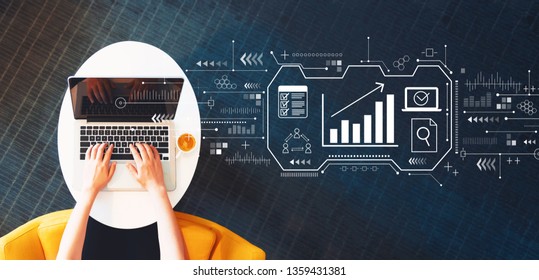 Marketing concept with person using a laptop on a white table - Shutterstock ID 1359431381
