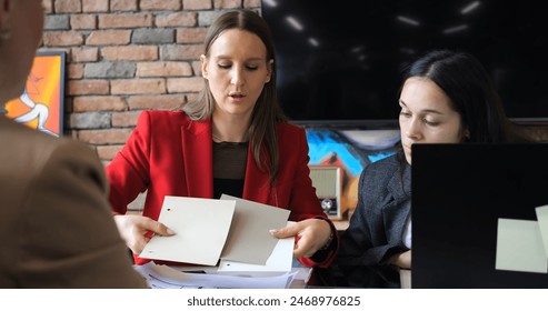 Marketing professionals in a meeting, analyzing audience insights and market trends. Strategizing a comprehensive campaign to promote brand and maximize impact through targeted advertising. - Powered by Shutterstock