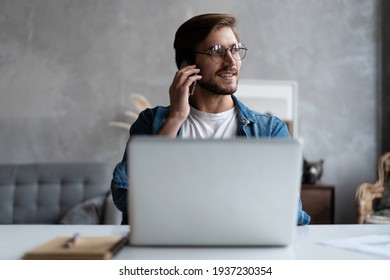 Marketing Sales Manager Consulting Client Making Offer Selling Talking On Phone Near Laptop In Home Office
