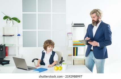 Marketing Team Meeting Brainstorming Research. Cute Kid Sitting In Office Chair Self Confident Like Big Boss, Funny Businessman Bossy Child, Director And Powerful Leader Humorous Concept.