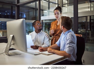 Marketing Team In Office, Working At Night On Advertising And Business Strategy. Group Meeting By Desk, Discuss Collaboration And Teamwork On Company Report. Teamwork, Leadership And Career Success