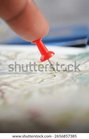 Marking a destination on a map with a red pin