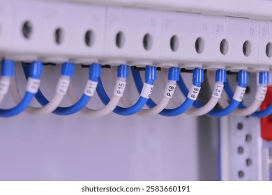 Marking of electrical wires using thermal printing on vinyl tape.