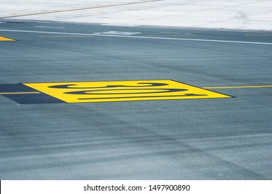Marking for ground transportation on the airport apron among taxiways
