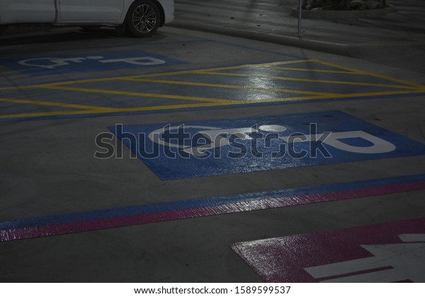 marking sign area of\
disabled parking lot