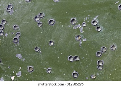 The marks of bullets and shrapnel on Board the armoured military vehicle