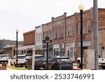 Marksville, Louisiana, USA - April 25, 2024: Afternoon traffic on Main Street  through the historic downtown core.