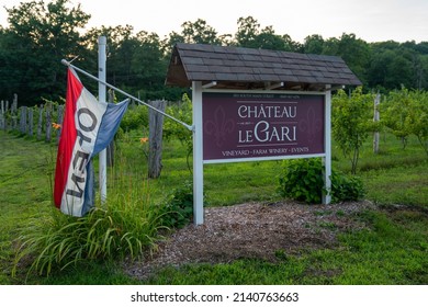 Marlborough CT, USA - July 18, 2020 - Front entrance sign to Chateau le Gari a local winery. Taken on a warm summer morning the image shows the entrance sign and part of the front vineyards. 