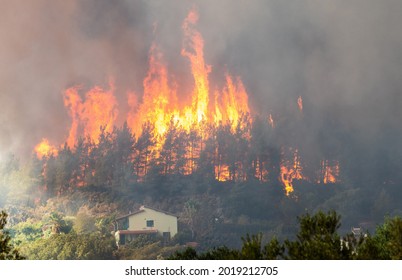 Marmaris, Mugla, Turkey – August 2, 2021.  Flames Of Forest Fire In Hisaronu Neighbourhood Of Marmaris Resort Town In Turkey, On August 2, 2021. 