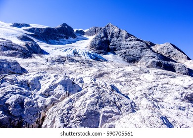 marmolada - the highest mountain at the european dolomites - with reservoir